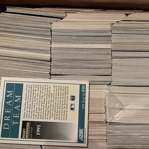 Hundred mixed Baseball, Hockey, Soccer cards from the 90’s in mint condition.